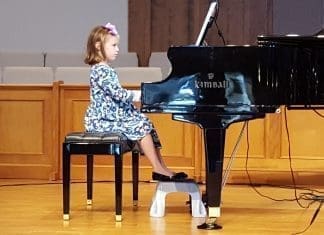 A-young-piano-student-performs-at-the-biannual-recital.jpg