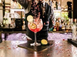 Barman Is Making Cocktail At Night Club.