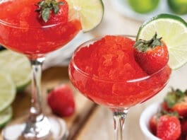 Frozen Strawberry Daiquiri Cocktail With Strawberries And Lime