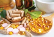 Top 5 Supplements to Spring into Health Alternative Medicine Herbal Organic Capsule With Vitamin E Omega 3 Fish Oil, Mineral, Drug With Herbs Leaf Natural Supplements For Healthy Good Life.