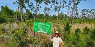 Bay County Conservancy Dr Mark Hyman Installs Sign